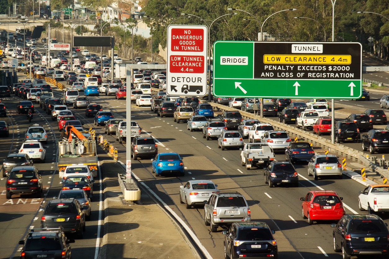 How Road Design Principles Shape Traffic Flow Dynamics for Safer and More Efficient Roads